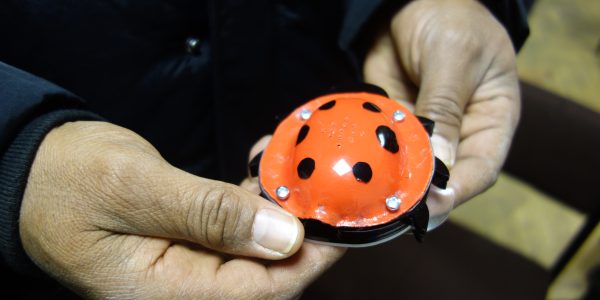 Taxi driver holding Air Quality sensor